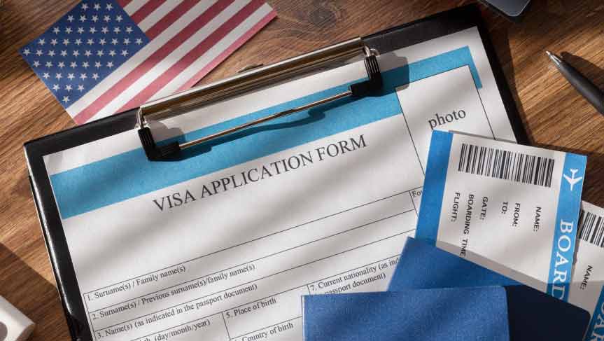 U.S. visa application form with small American flag in background
